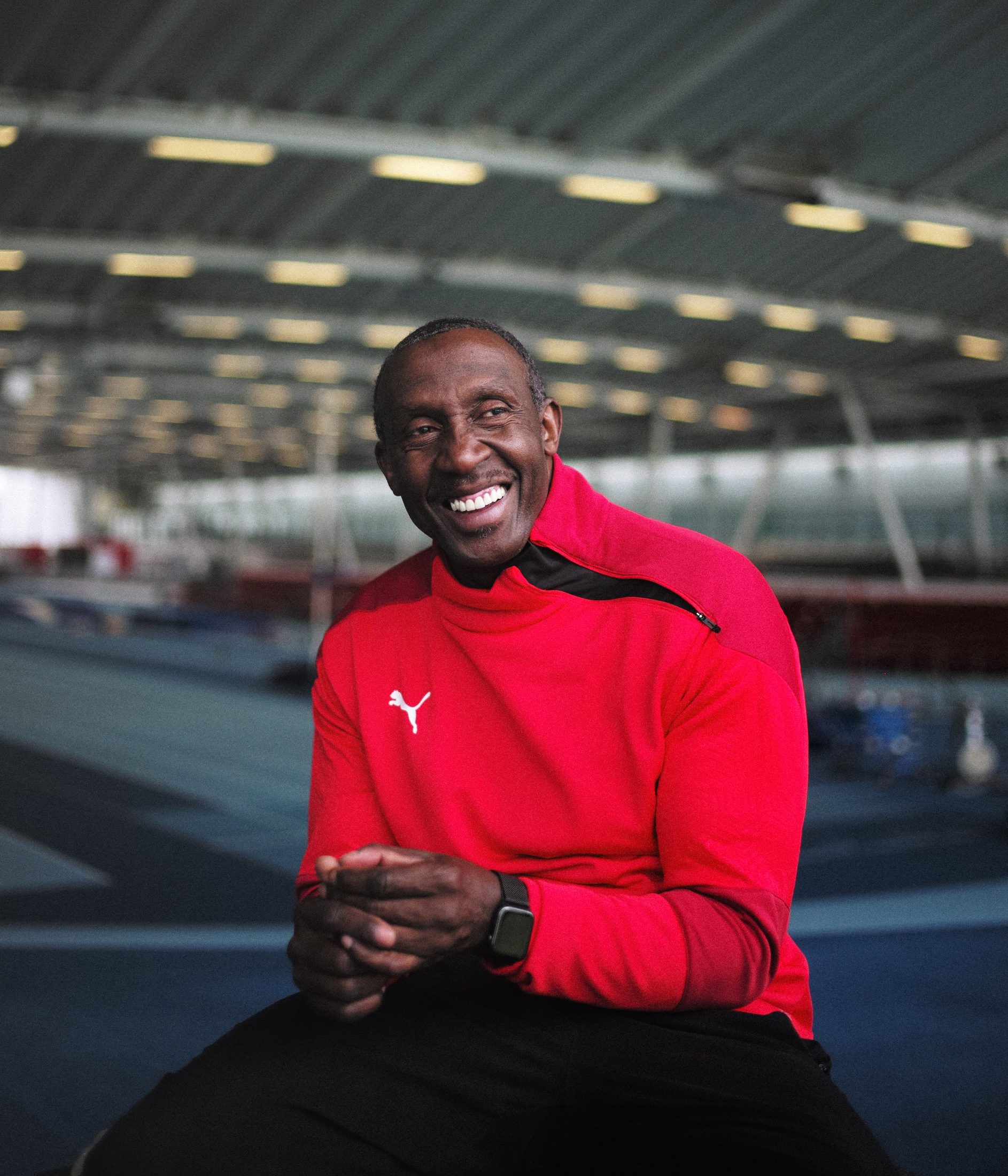 Linford Christie laughing, photographed for PUMA