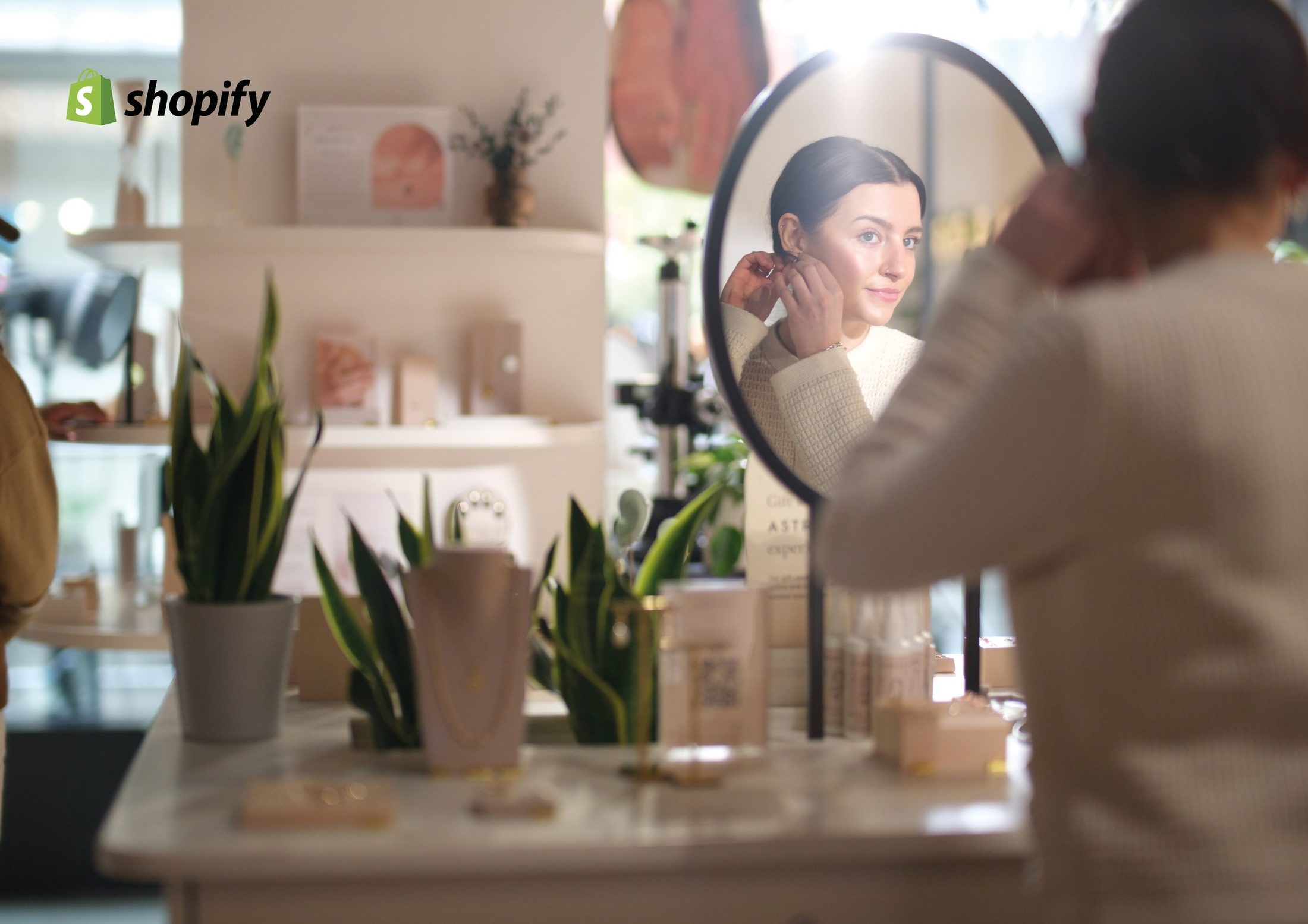 A woman in a shop mirror, Shopify