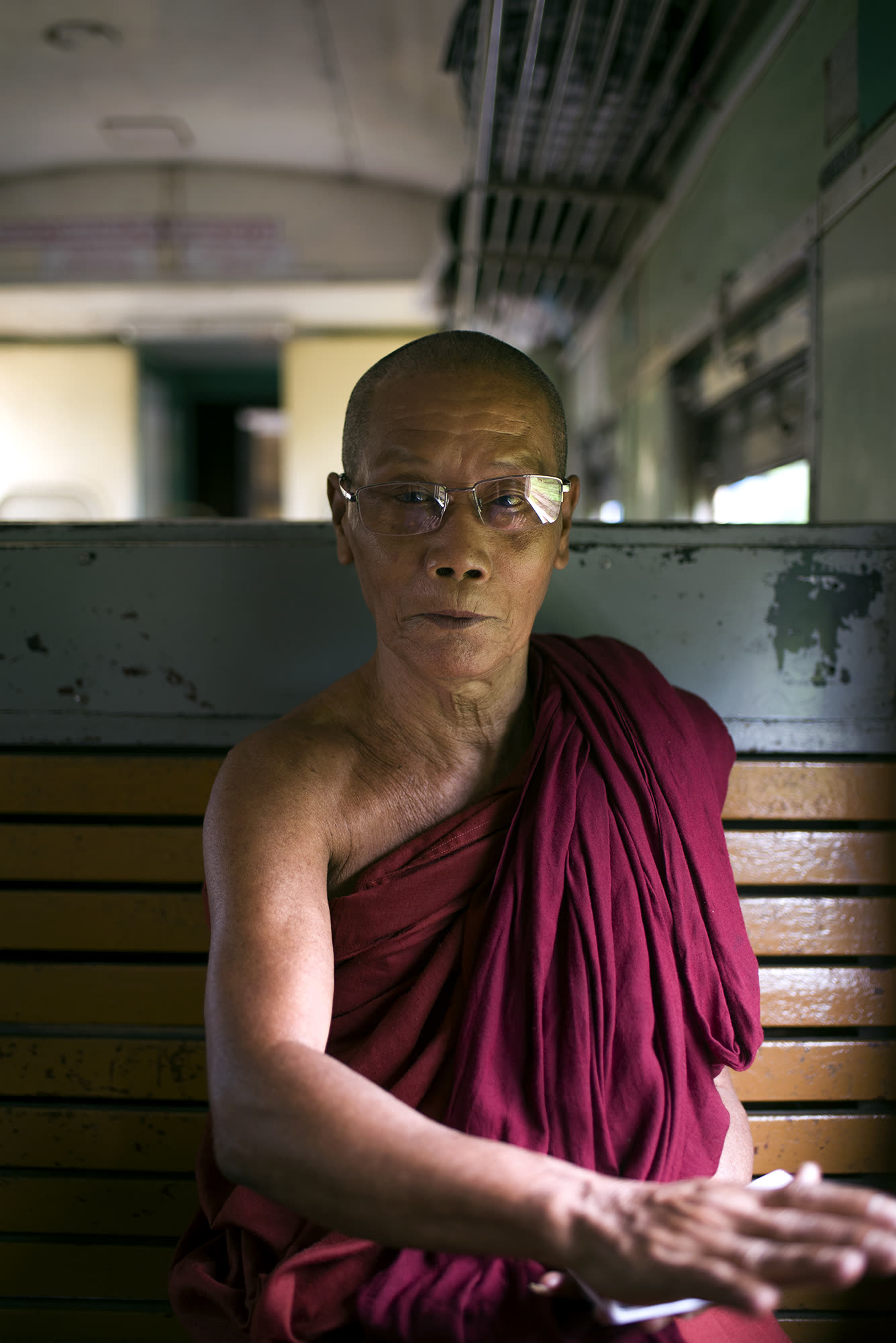 A monk in the carriage of the Mandalay Express